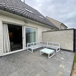 Instapklare halfopen woning met tuin en garage op centrale ligging!