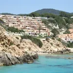 Piso con vistas en primera linea de playa en Cala Tarida.