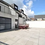 Nieuwbouw appartement met 3 slaapkamers en garage.