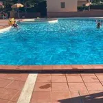 Villa a schiera arredata con piscina