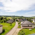 Modernes Wohnen mit sonnigem Dachbalkon im Energiesparhaus in schöner Lage von Konz-Obermennig: Scherf Immobilien Trier